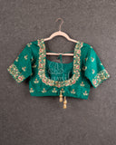 Green Elbow sleeves blouse with multi color thread and zari work