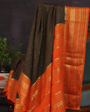 Mysore crepe silk saree in a lovely color combo of black and orange