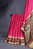 A lovely hot pink Bandini saree with kalamkari print on Modal silk