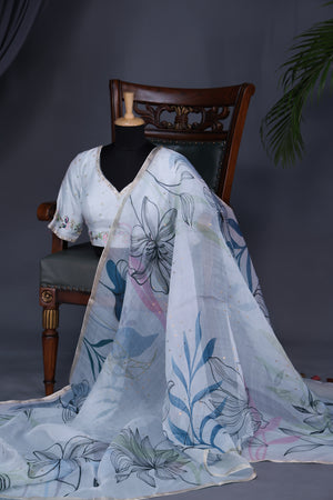 Stunning Organza saree in powder blue with woven sequins
