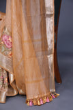 Crushed Tissue saree with an embroidered thread work border