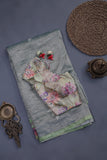 Crushed Tissue saree with all over embroidered buttas