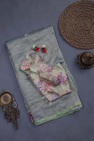 Crushed Tissue saree with all over embroidered buttas