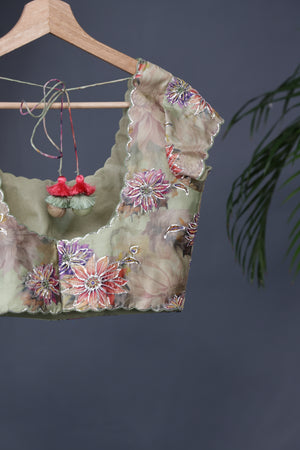 Crushed Tissue saree with all over embroidered buttas