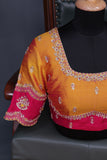 A rich kanjeevaram silk saree in yellow and pink dual tone