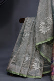 Crushed Tissue saree with all over embroidered buttas