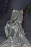 Crushed Tissue saree with all over embroidered buttas