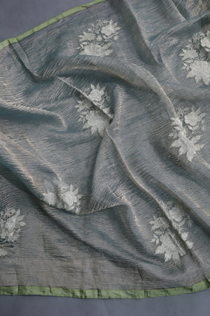 Crushed Tissue saree with all over embroidered buttas