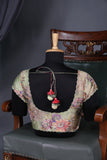 Crushed Tissue saree with all over embroidered buttas