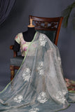 Crushed Tissue saree with all over embroidered buttas