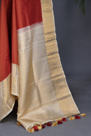 Kanjeevaram silk saree in a lovely red and off white combo