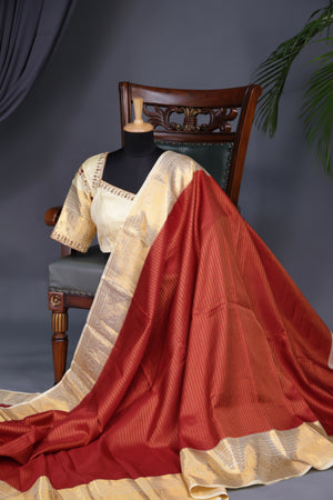Kanjeevaram silk saree in a lovely red and off white combo