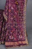 Purplish Wine color Pure Patola saree with maggam work border