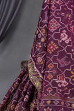 Purplish Wine color Pure Patola saree with maggam work border