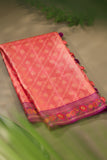A beautiful kanjeevaram saree in peach with resham thread work floral border