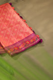 A beautiful kanjeevaram saree in peach with resham thread work floral border