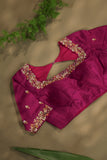 A beautiful kanjeevaram saree in peach with resham thread work floral border