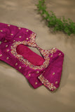 A beautiful kanjeevaram saree in peach with resham thread work floral border