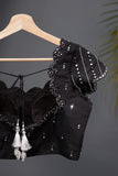A lovely soft silk floral saree in black with a mirror work blouse