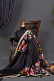 A lovely soft silk floral saree in black with a mirror work blouse