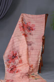 A lovely tussar floral saree with beautiful scalloped mirror embroidery