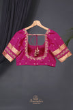 A beautiful mysore crepre silk saree in soft peach and rani pink combination