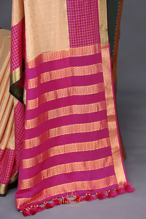 A beautiful mysore crepre silk saree in soft peach and rani pink combination