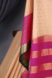A beautiful mysore crepre silk saree in soft peach and rani pink combination