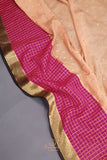 A beautiful mysore crepre silk saree in soft peach and rani pink combination