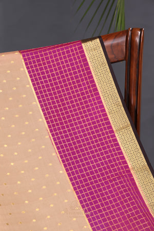 A beautiful mysore crepre silk saree in soft peach and rani pink combination