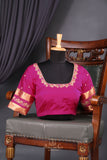 A beautiful mysore crepre silk saree in soft peach and rani pink combination