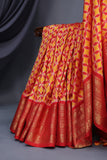 Ikkat Kanchi saree in hues of orange & red - absolutely gorgeous