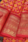 Ikkat Kanchi saree in hues of orange & red - absolutely gorgeous