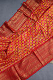 Ikkat Kanchi saree in hues of orange & red - absolutely gorgeous