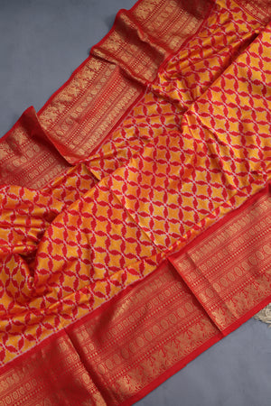Ikkat Kanchi saree in hues of orange & red - absolutely gorgeous