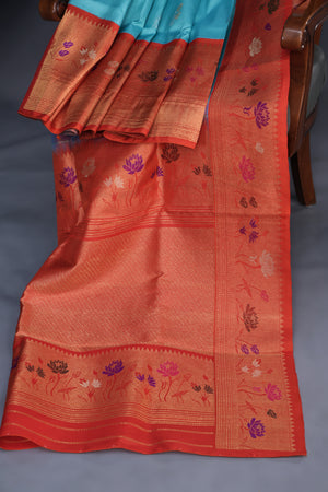 Aqua Blue Gadwal saree with Meenakari floral border in orange