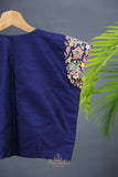 A lovely organza saree in shaded yellow with a dark blue designer blouse