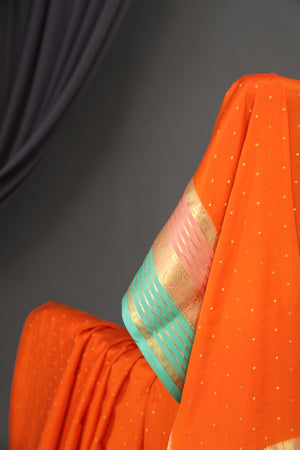 Pure mysore crepe silk saree in a beautiful shade of orange
