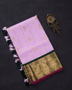 Gadwal kanchi saree in a beautiful lavender and emerald green combo