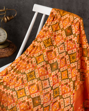 Twill Patola saree in a lovely shade of mustard