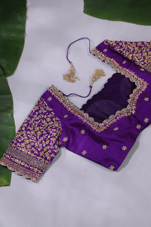Mint Green Kanjeevaram saree with a purple border