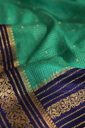Gorgeous Mysore Silk Saree in green with  a contrast blue border