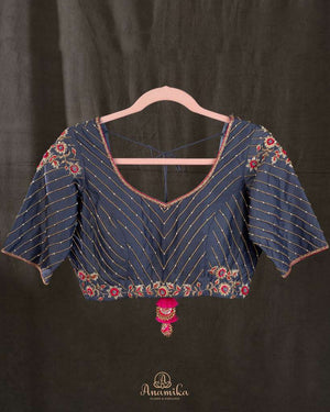 A dark navy blouse in pure silk with beautiful embroidery