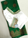 Banarasi Dupion saree in dark green with gold Zari border and motifs