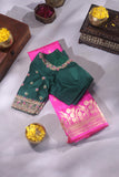 Raw Mango saree in bubble gum pink paired with a contrast dark green blouse