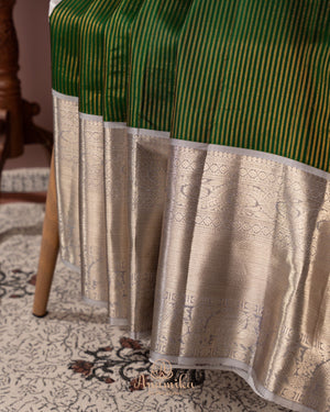 Dark green kanjeevaram saree with contrast grey border and pallu