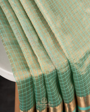 Green tissue soft silk saree with checkered design