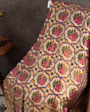 Light brown twill Patola saree with a contrast lavender border