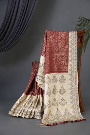 Tmeless kanjeevaram in a maroon shade