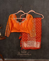 Orange Crush Tissue saree with a stunning net sleeves blouse